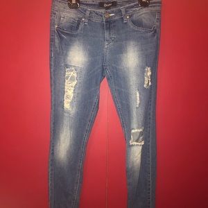 Distressed blue jeans